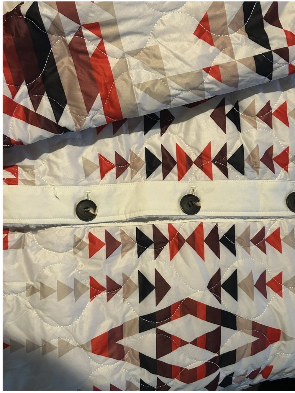 Macy's White Quilted Jacket with Red, Black and Tan Geometric Print